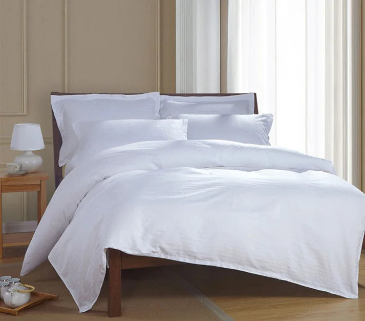 Elevate your sleeping experience with this Pure White Striped Duvet Cover