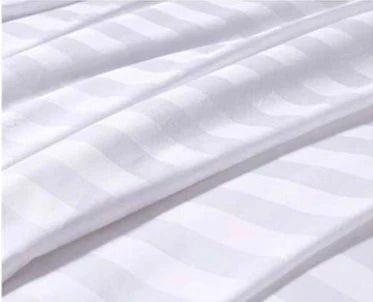 Elevate your sleeping experience with this Pure White Striped Duvet Cover
